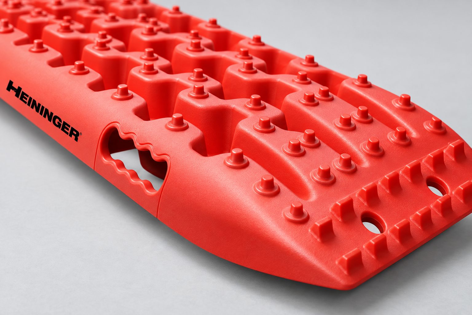 Close-up of raised traction studs and channels